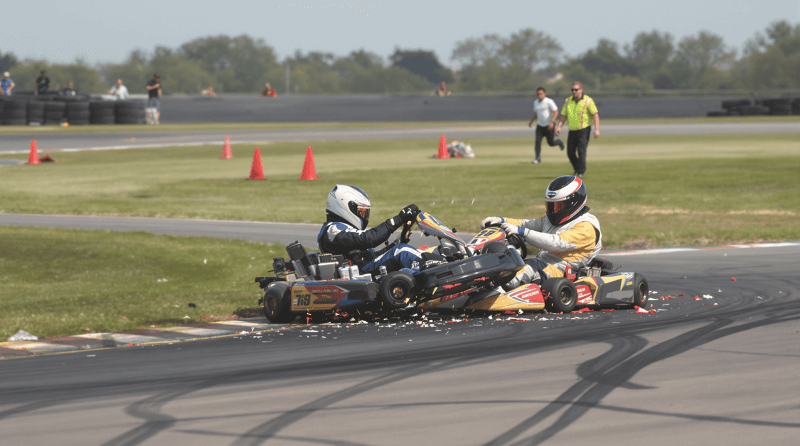 Go-kart accident on track illustrating the importance of safety tips and accident prevention