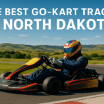 Professional go-kart racer on racing track with North Dakota prairie landscape